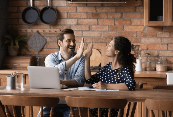 man and woman high five
